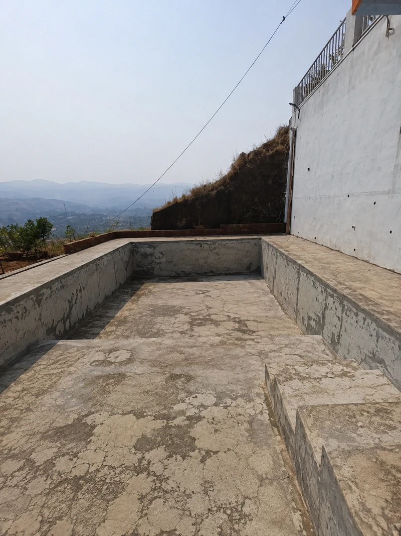 Industrial water tank before lining, showing corrosion